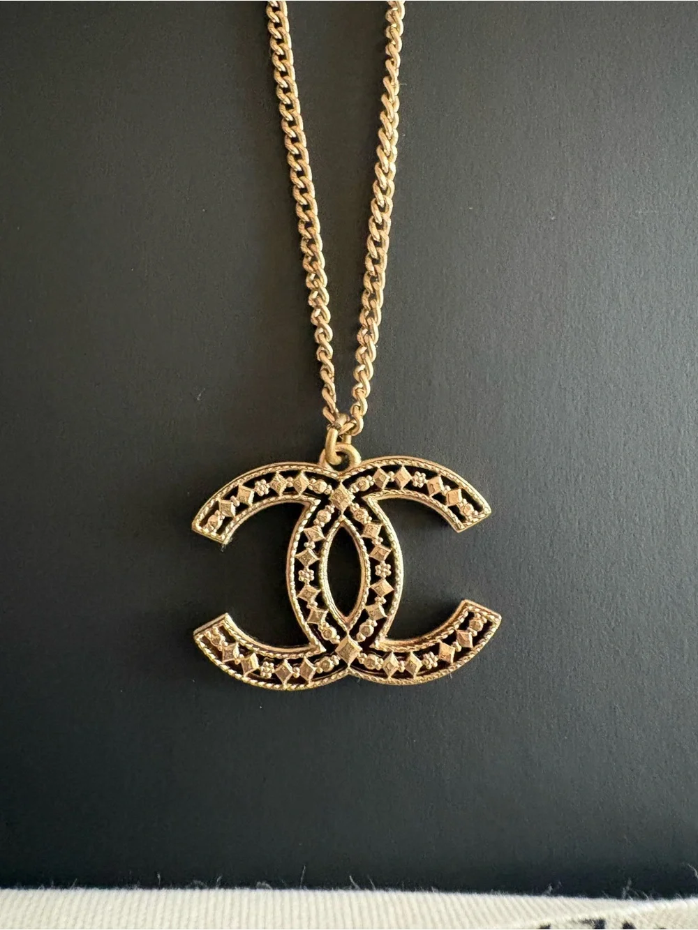 CHANEL Gold-Tone Interlaced CC Pendant Necklace